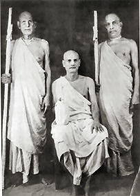 Srila Bhakti Prajnana Kesava Maharaja (center) and his sannyasa disciples, Srila Bhaktivedanta Muni Maharaja (left) and Srila Bhaktivedanta Swami Prabhupada (right)