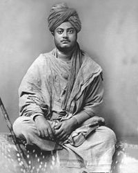 Swami Vivekananda sitting, black and white image